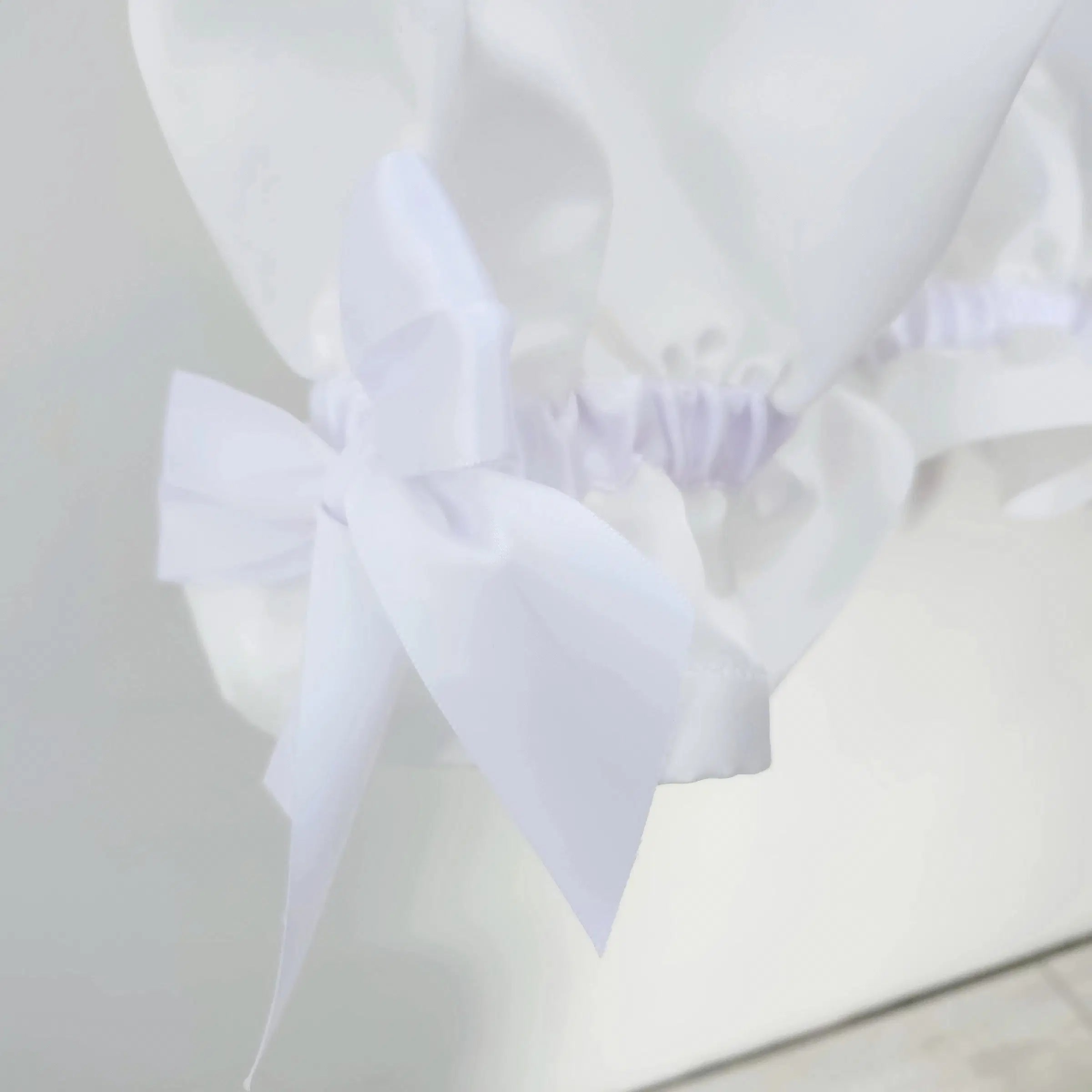 close up view of ribbon detail on Flower girl Romper with Pantaloons image 4