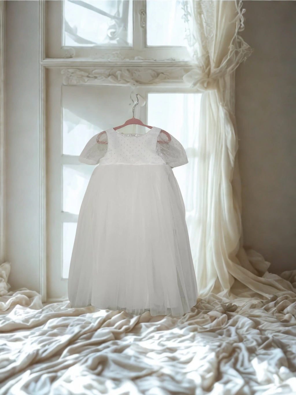  White flower girl Dress hanging in a window image 0