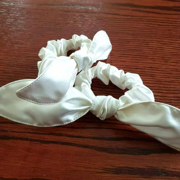 Close up view of two Flower girl scrunchie hair accessory image 3