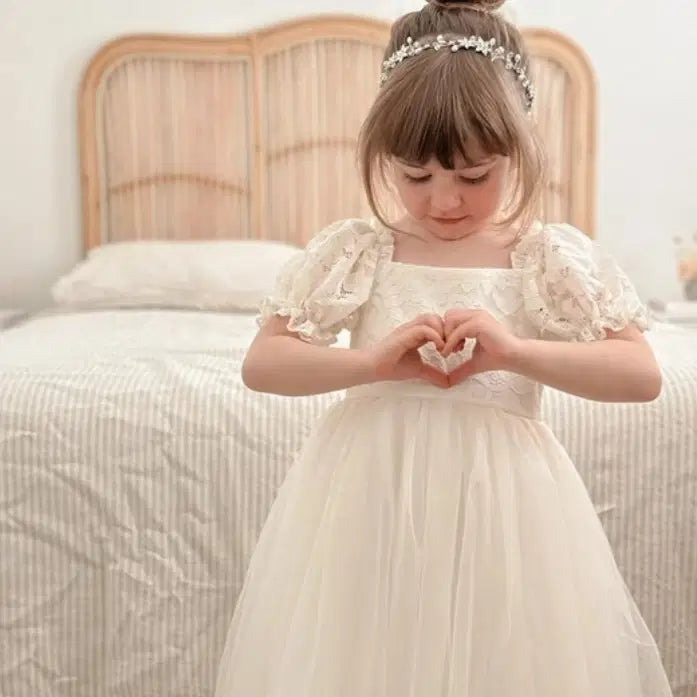 model wearing a flower girl Headpiece For Weddings image 0