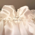  Close up of a Silk Satin Flower Girl Dress image 0