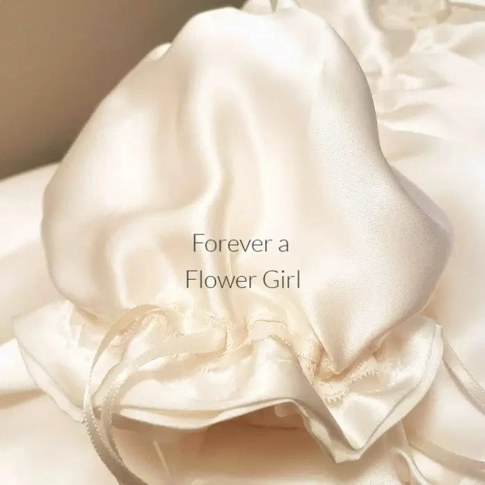 Close up view of puff sleeve on a Silk Satin Flower Girl Dress image 1
