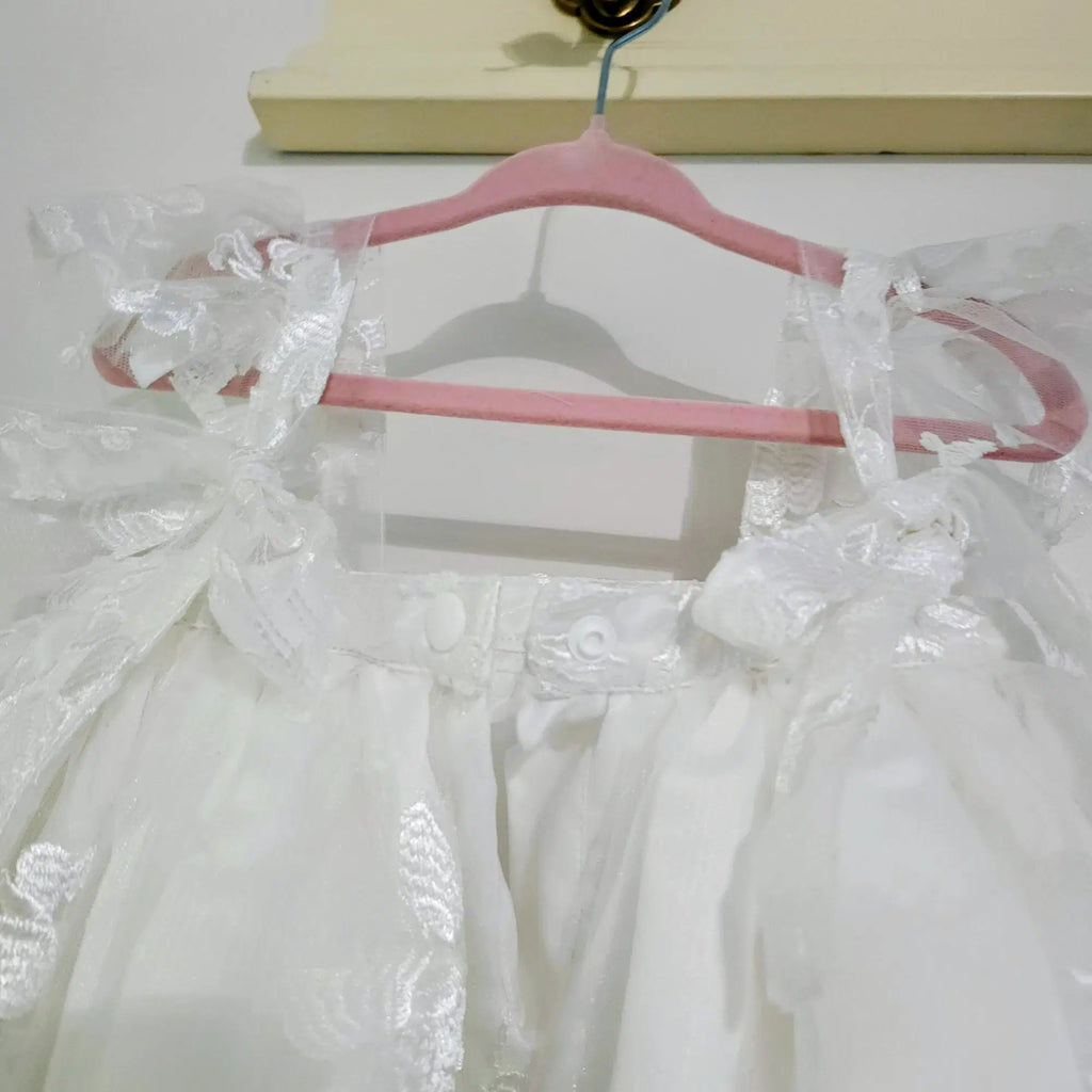 close up view of adjustable straps on a Babydoll Flower Girl Dresses image 2