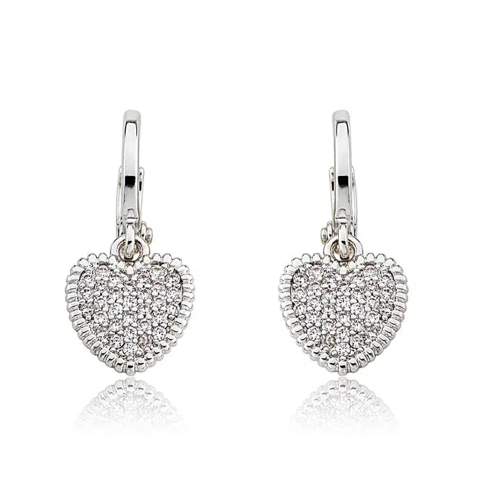 close up view of Girlssilver heart shaped earrings image 1