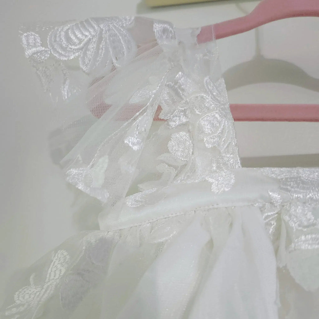 close up view of flutter sleeves on Babydoll Flower Girl Dresses image 1