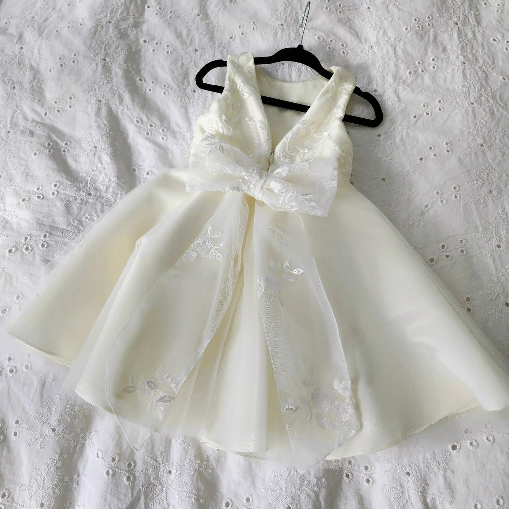 flat view of lace bow on Classic Ivory Flower Girl Dress With Tulle image 3