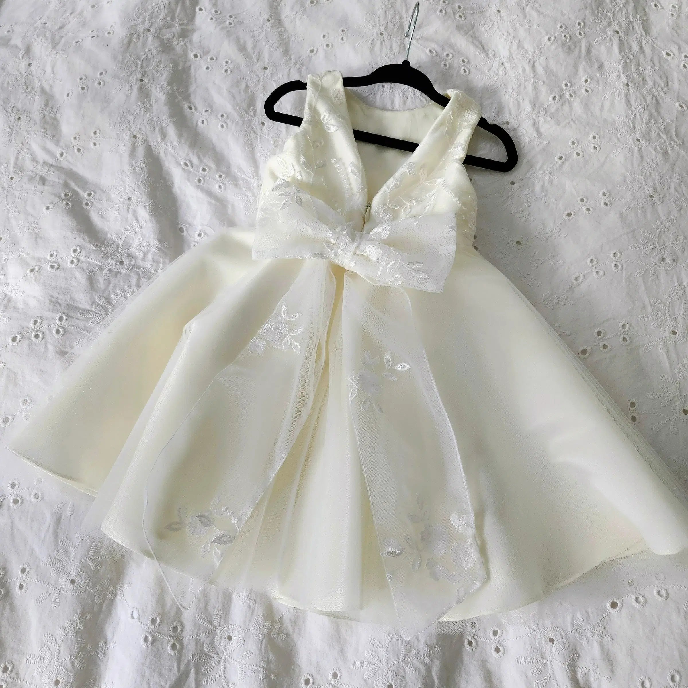 flat view of lace bow on Classic Ivory Flower Girl Dress With Tulle image 3