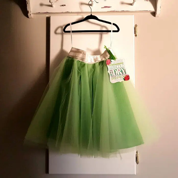 Green Tutu Skirt hanging on a hook image 0