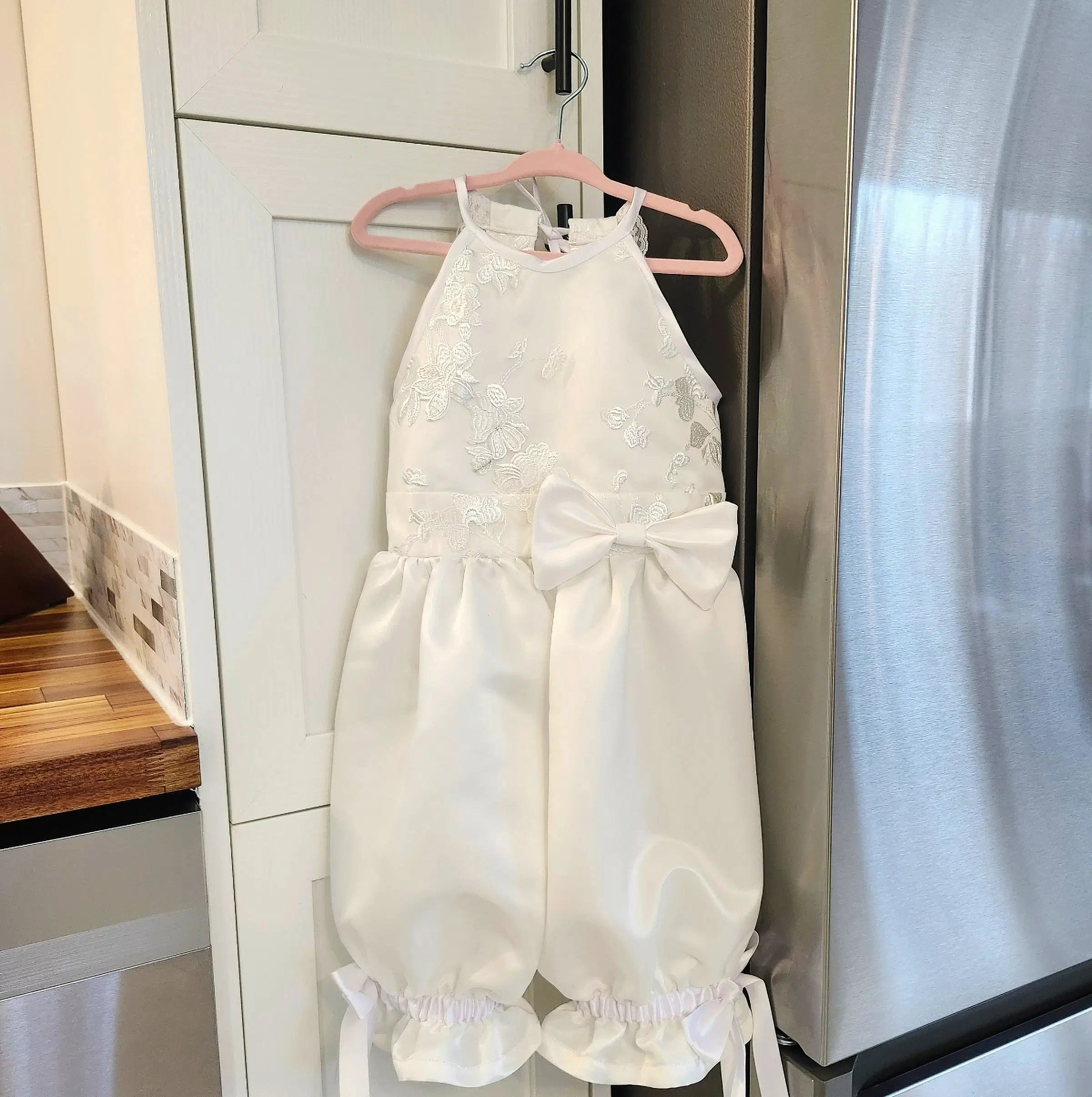 Flower girl Romper with Pantaloons hanging from a hanger image 5