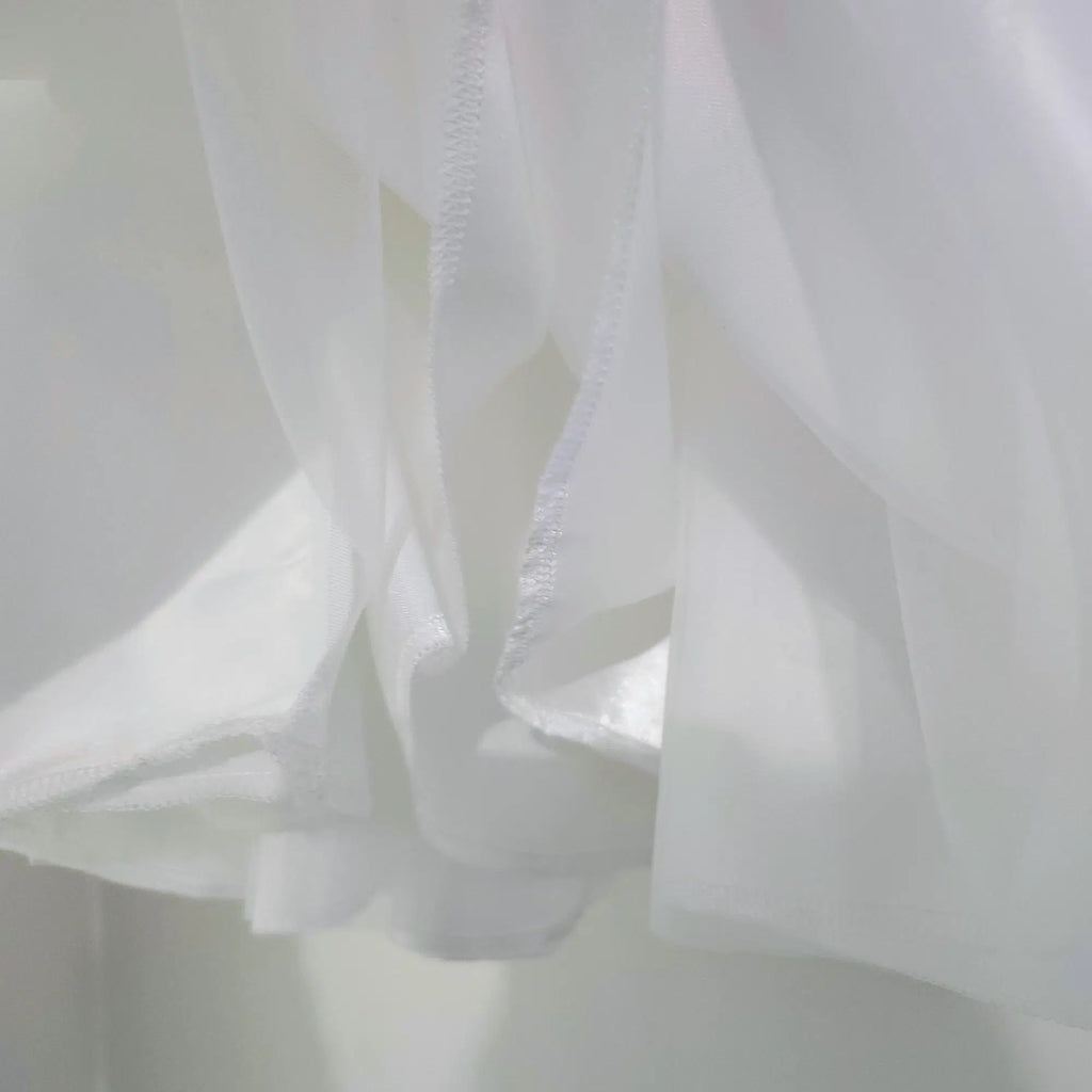 close up view of hem on Babydoll Flower Girl Dresses image 4