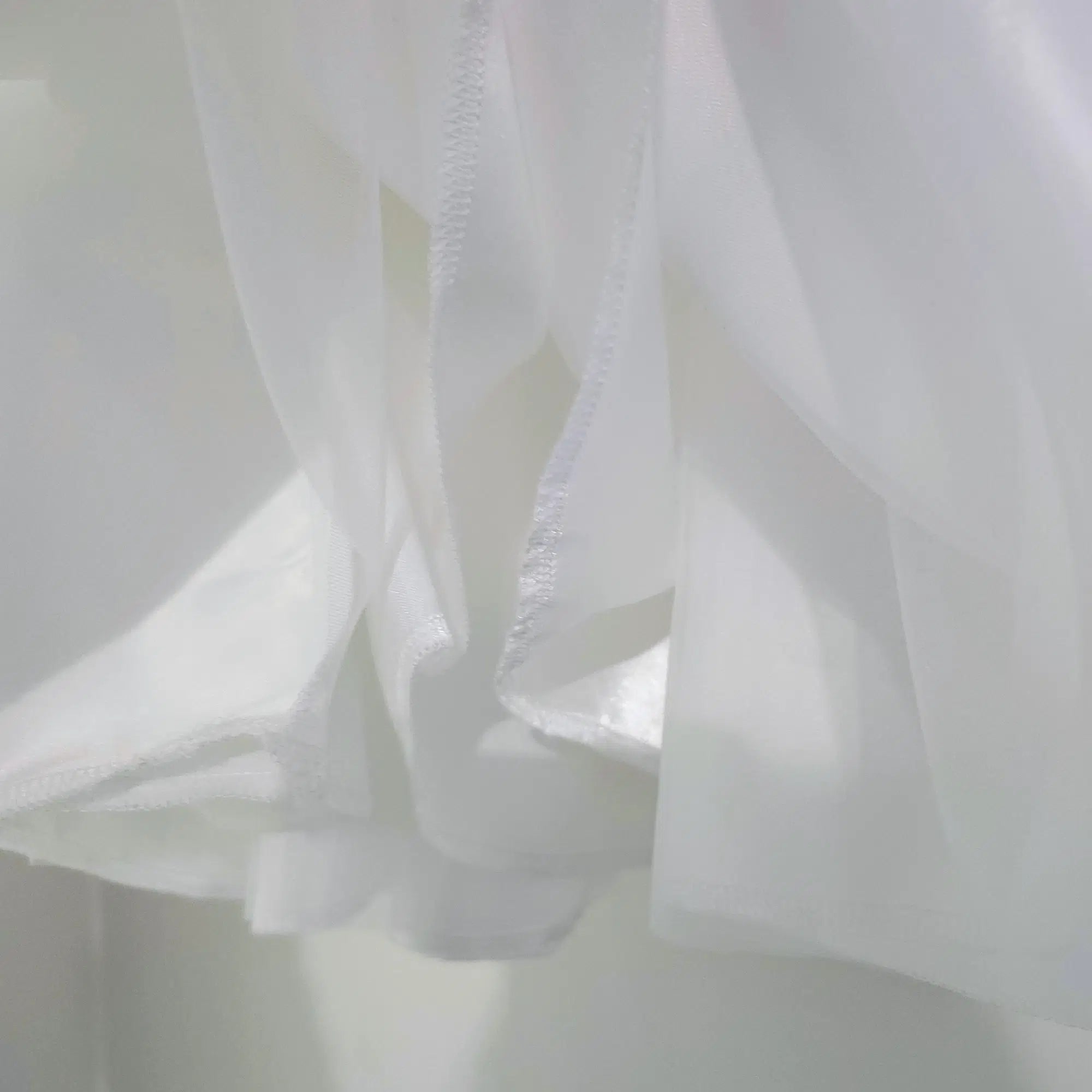 close up view of hem on Babydoll Flower Girl Dresses image 4