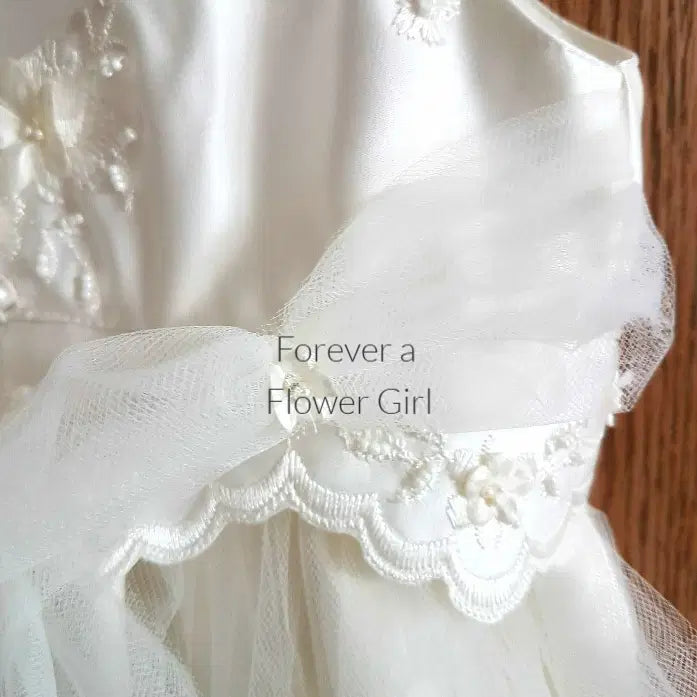 view of tulle sash on Silk Ivory Flower Girl Dress image 3