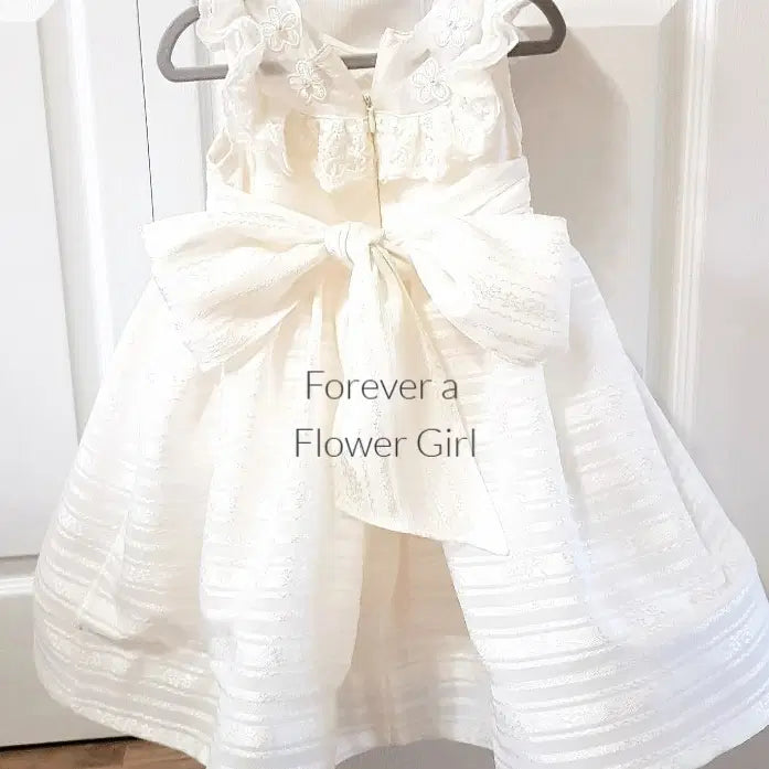 Back view of Ivory Silk Flower Girl Dress with large bow image 2