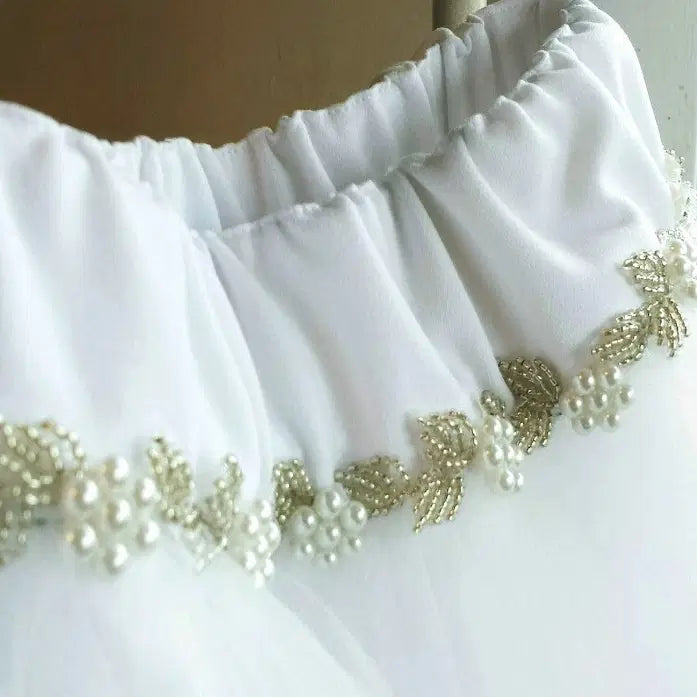 close up view of pearls on Girls White Tulle Skirt image 1