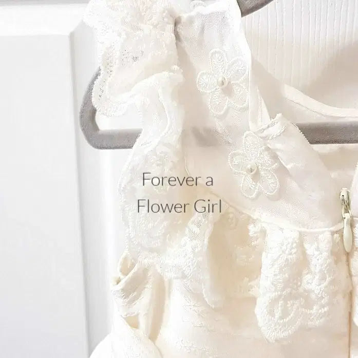 Close up view of Ivory Silk Flower Girl Dress image 0