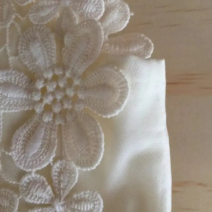 close up view of lace bodice on Ivory flower girl dress For Wedding image 2