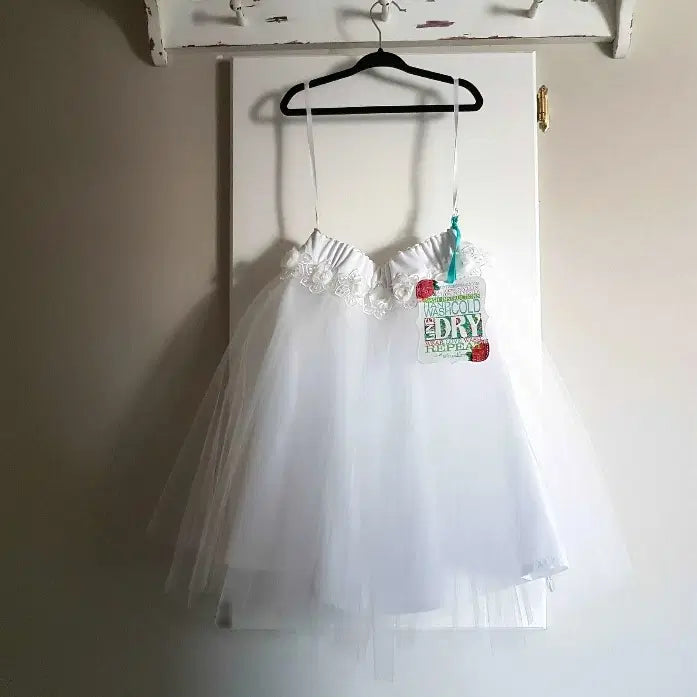 White Tutu Skirt hanging on a hook image 2