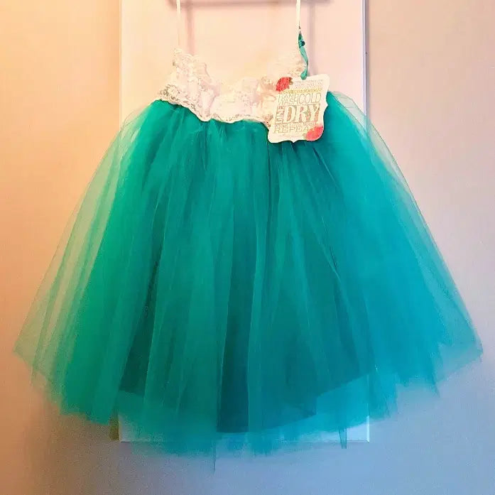Teal Green Tutu skirt for Kids hanging on a hook image 6