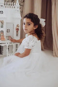 model wearing a White Lace Flower Girl Dress with puff sleeves image 0