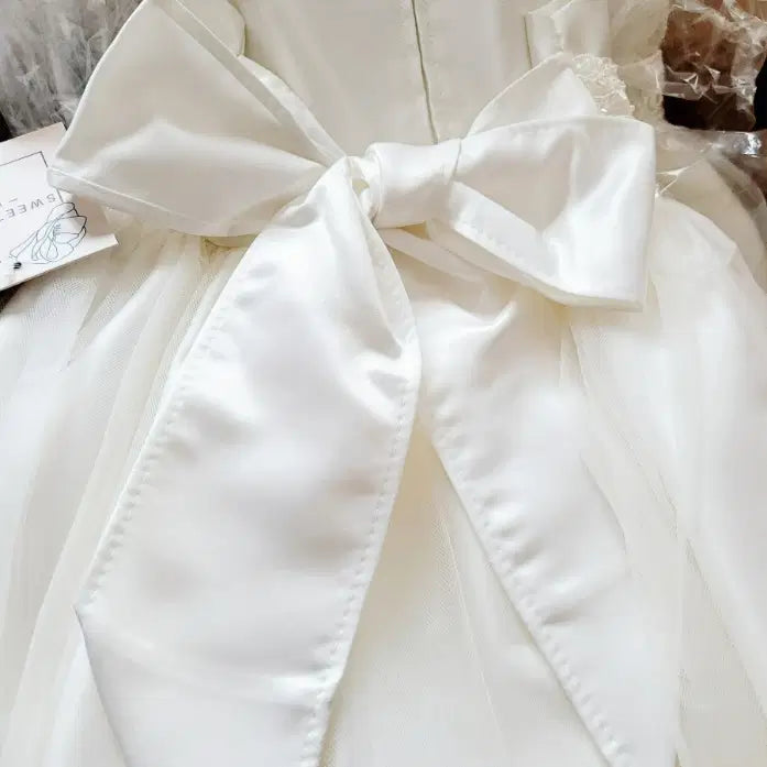 back view of large bow on Tea Length Flower Girl Dresses image 1