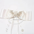 Flower girl hair accessory with bow and pearls image 0