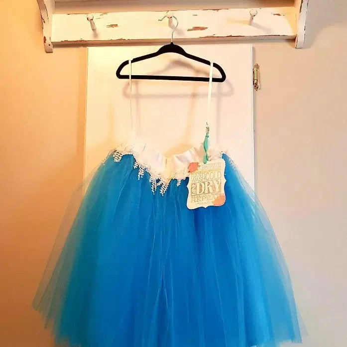 close up view of Turquoise Tutu Skirt hanging on a hook For Girls image 4