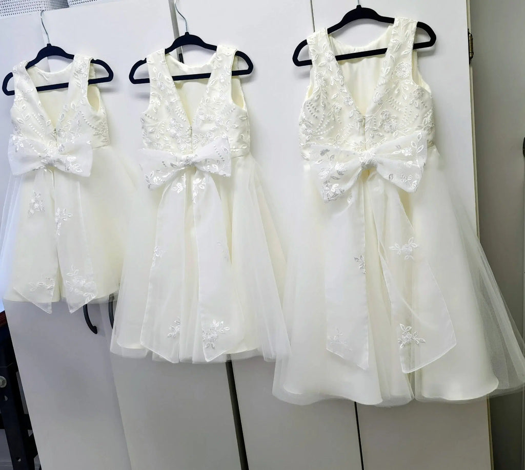 back view of three Classic Ivory Flower Girl Dresses With Tulle and Lace Bow image 8